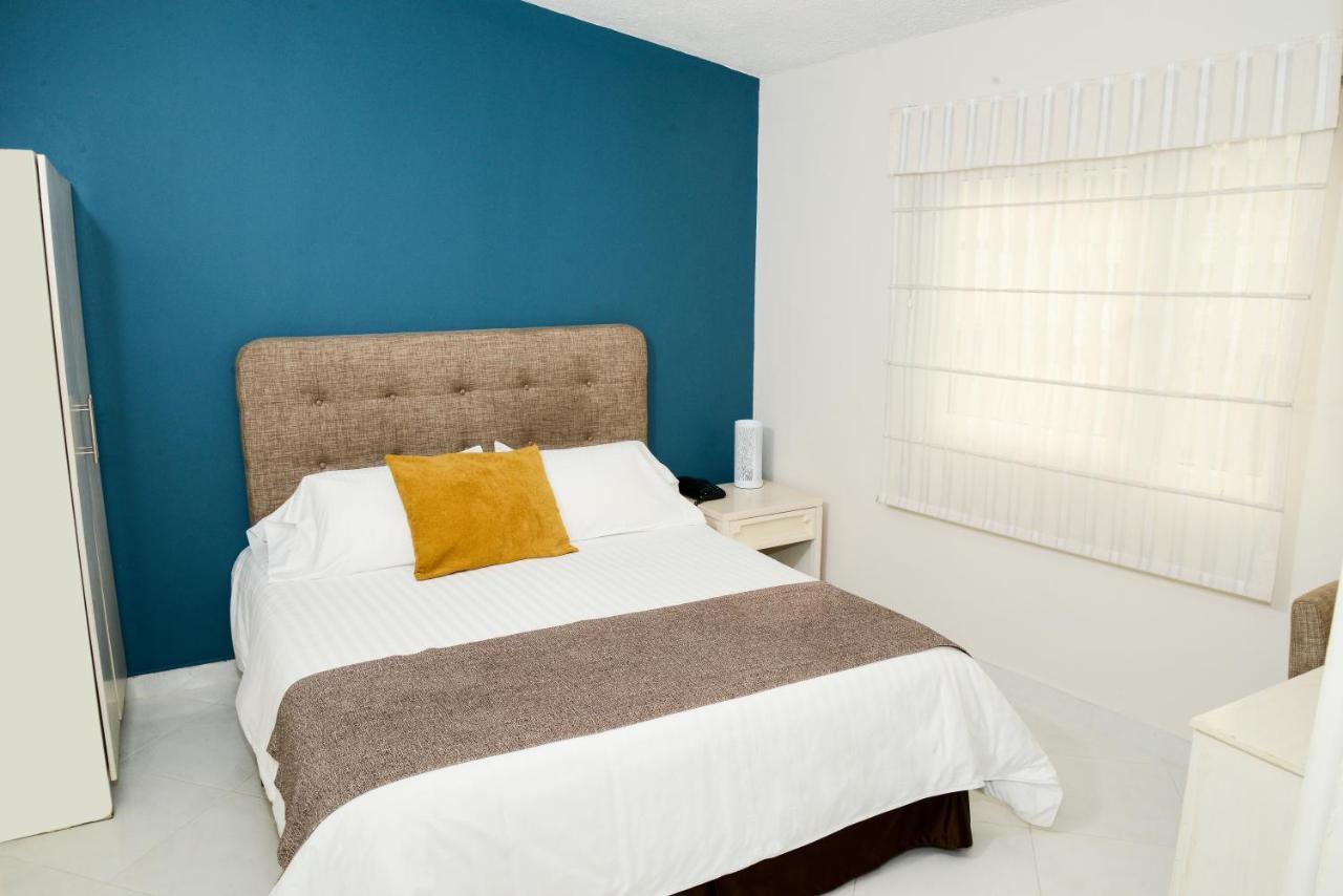 Hotel Prado 34 West بوكارامانغا المظهر الخارجي الصورة